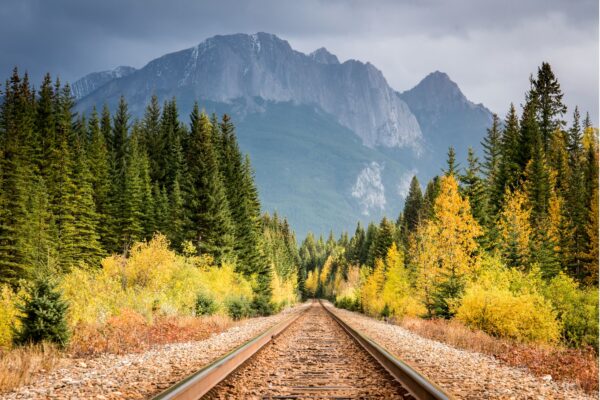 How much does it cost to travel by train across Canada